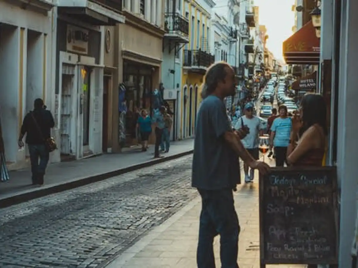 a man and a woman walking down a street