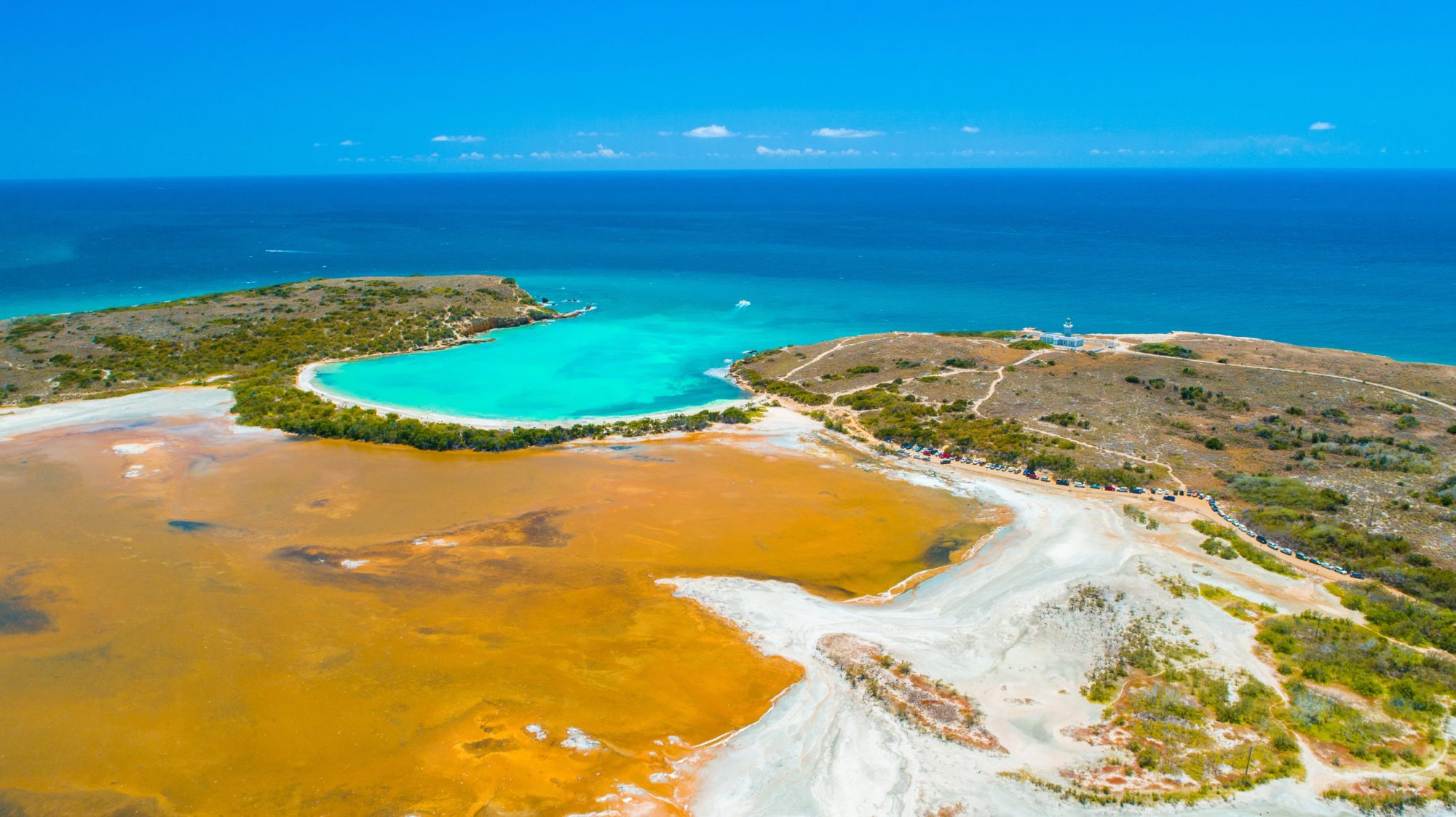 Aerial view of Puerto Rico. Faro Los Morrillos de Cabo Rojo. Playa Sucia beach and Salt lakes in Punta Jaguey. Aerial view of Puerto Rico. Faro Los Morrillos de Cabo Rojo. Playa Sucia beach and Salt lakes in Punta Jaguey.